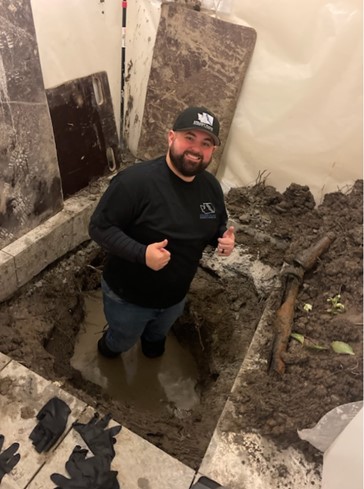 Man Solving Sewer Line Issues in Seattle, WA